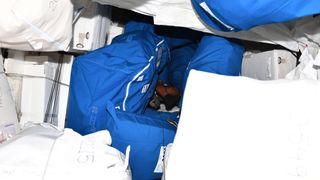 NASA astronaut Raja Chari inside a 'giant space closet'.