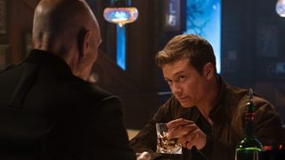 Jack Crusher and Jean Luc Picard having a drink in Star Trek: Picard.