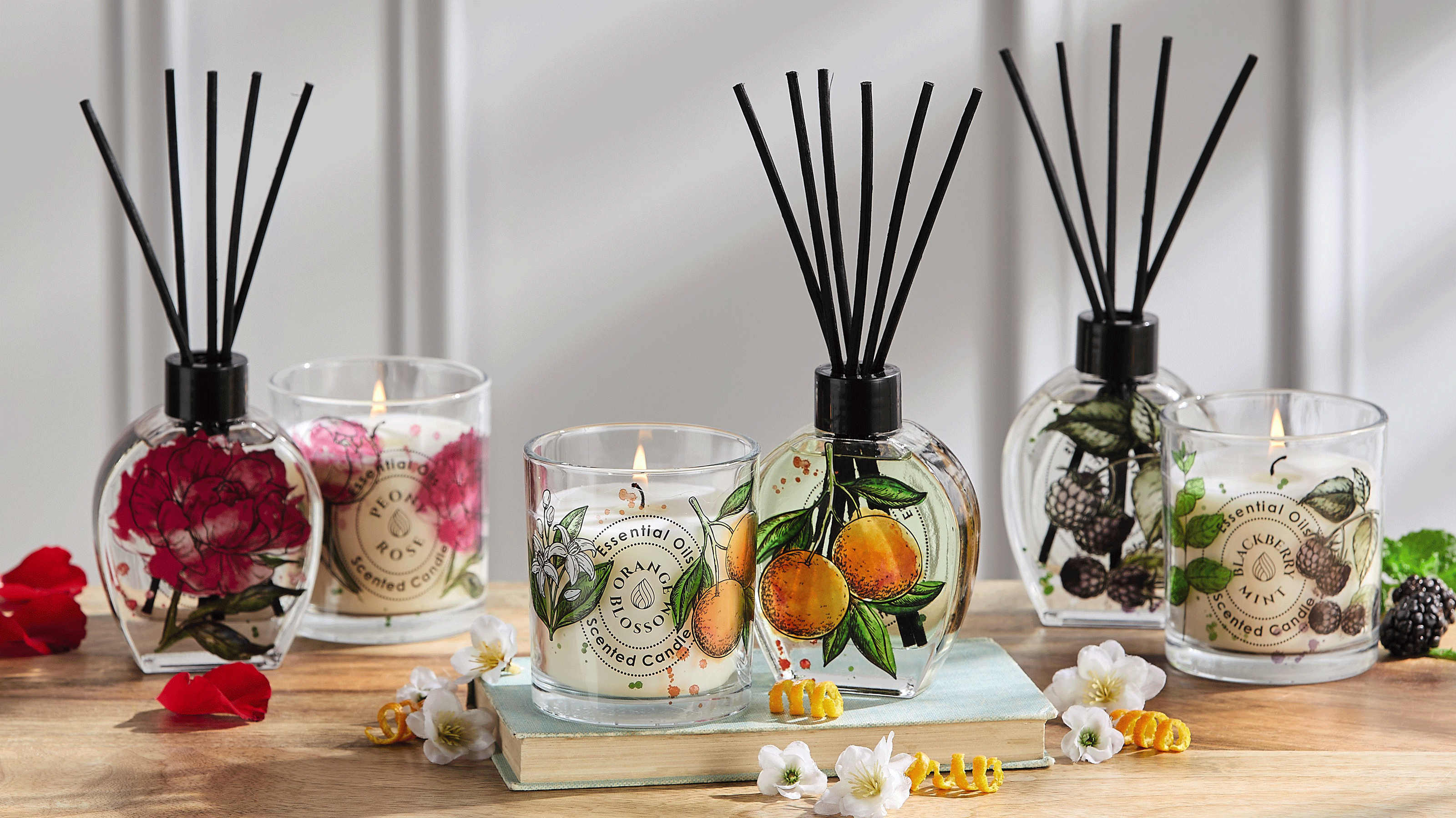 Aldi candle with floral and fruit motif