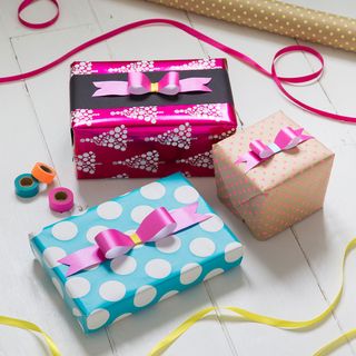 ribbon with wooden flooring and gifts
