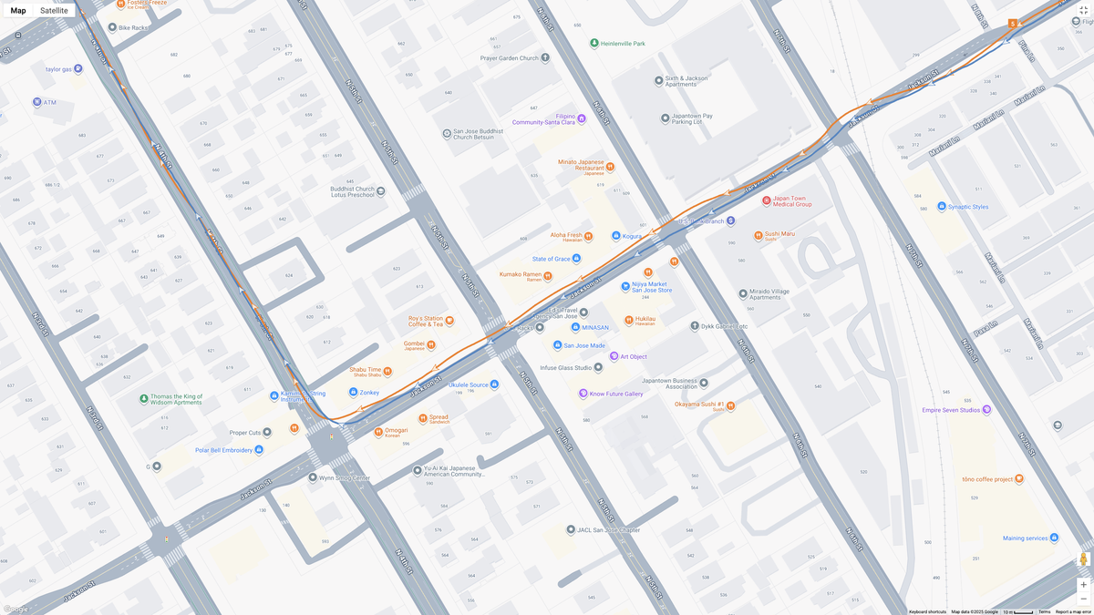 A GPS map showing how the Garmin Forerunner 970 (blue line) and Google Pixel Watch 4 (orange line) compare for a half-marathon test.