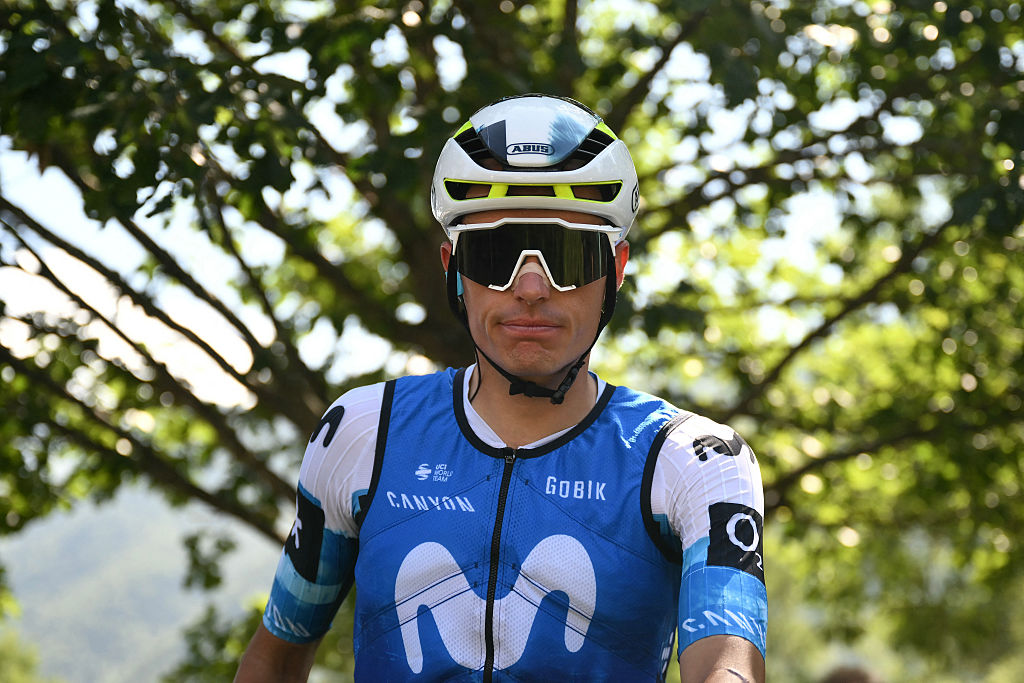Movistar Team&#039;s Spanish rider Enric Mas waits to take the start of the 13th stage of the 112th edition of the Tour de France cycling race, 10.9 km individual time trial between Loudenvielle and Peyragudes, in the Pyrenees mountains of southwestern France, on July 18, 2025. (Photo by Marco BERTORELLO / AFP)