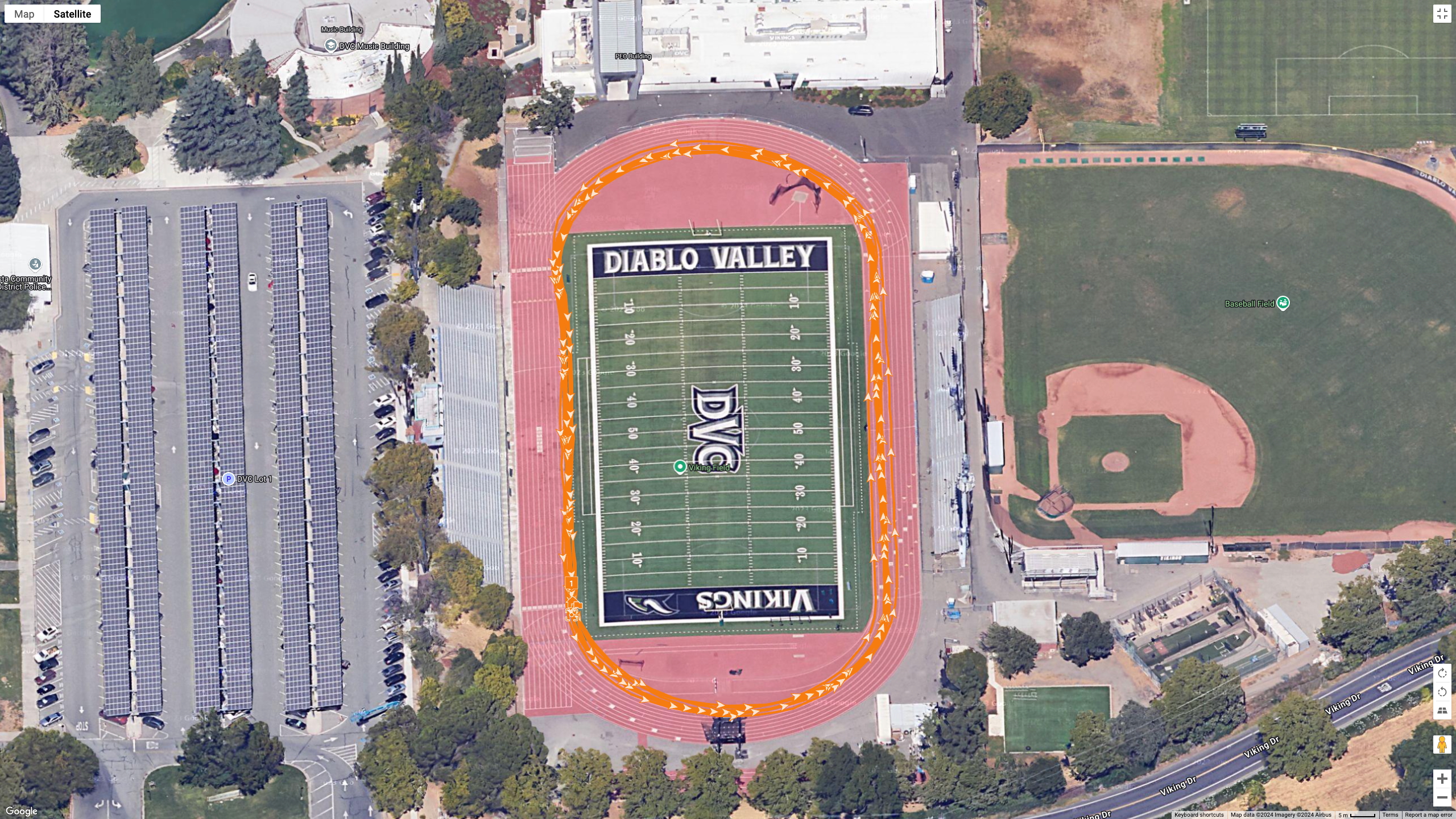 A Google Maps satellite view showing how the Polar Vantage M3 (orange line) matched up to a track run completed in lane 1.