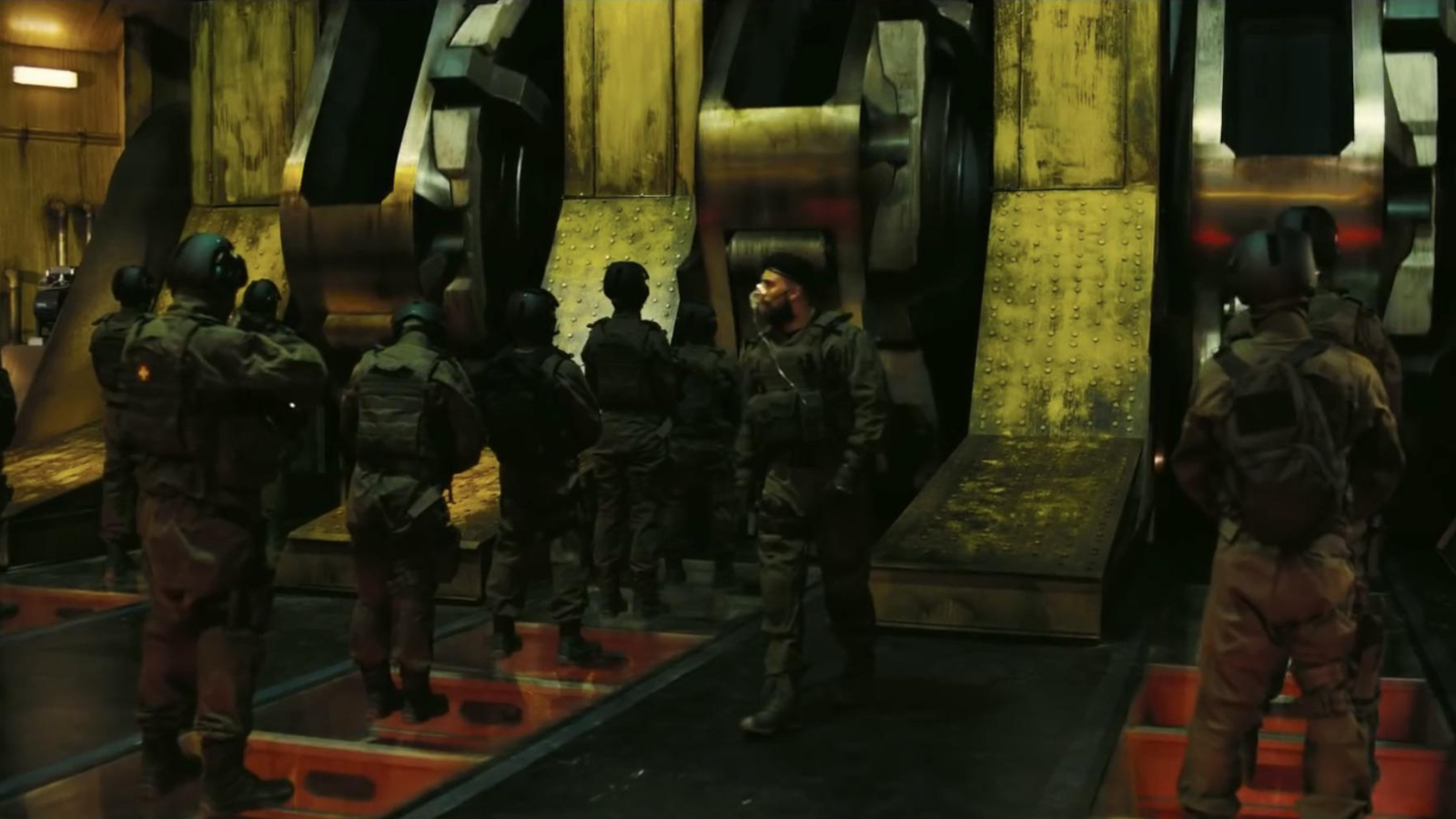 A group of soldiers queueing up the entropy reversing turnstiles in Tenet.