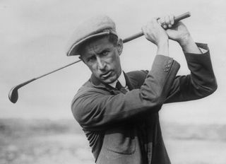Jim Barnes swinging golf club