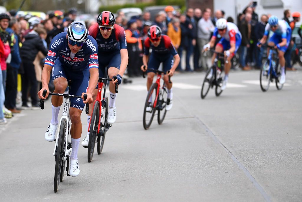 WAREGEM BELGIUM MARCH 30 LR Mathieu Van Der Poel of Netherlands and Team AlpecinFenix Ben Turner of United Kingdom and Thomas Pidcock of United Kingdom and Team INEOS Grenadiers compete during the 76th Dwars Door Vlaanderen 2022 Mens Elite a 1837km one day race from Roeselare to Waregem DDV22 DDVmen WorldTour on March 30 2022 in Waregem Belgium Photo by Tim de WaeleGetty Images