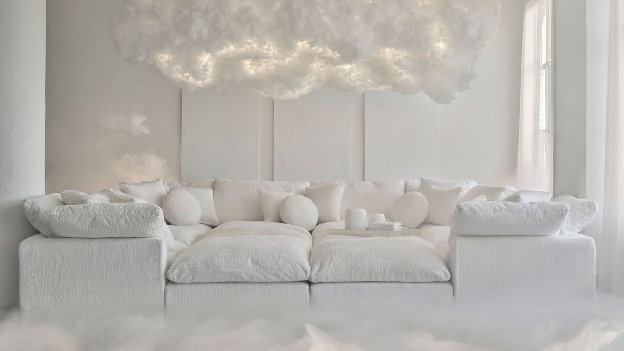 &#039;Cloud Dancer&#039; upholstered modular sofa from Joybird&#039;s Pantone collaboration, pictured in a similarly shaded, brightly lit living room