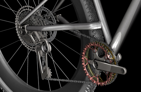 multi coloured triple front chainset drivetrain on a black background