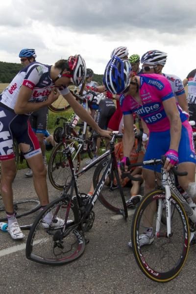 Jelle Vanendert (Lotto Belisol) calls for assistance on his radio.