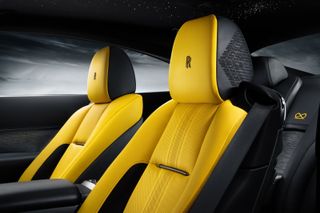 Yellow seats inside Rolls-Royce Black Badge Wraith Black Arrow