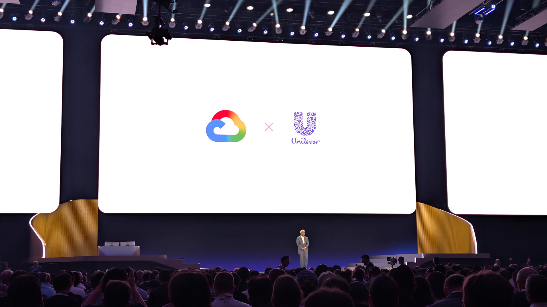 Thomas Kurian, CEO at Google Cloud, onstage at the Google Cloud Next 2026 opening keynote underneath a screen displaying the Google Cloud and Unilever logos with an 'x' in between.