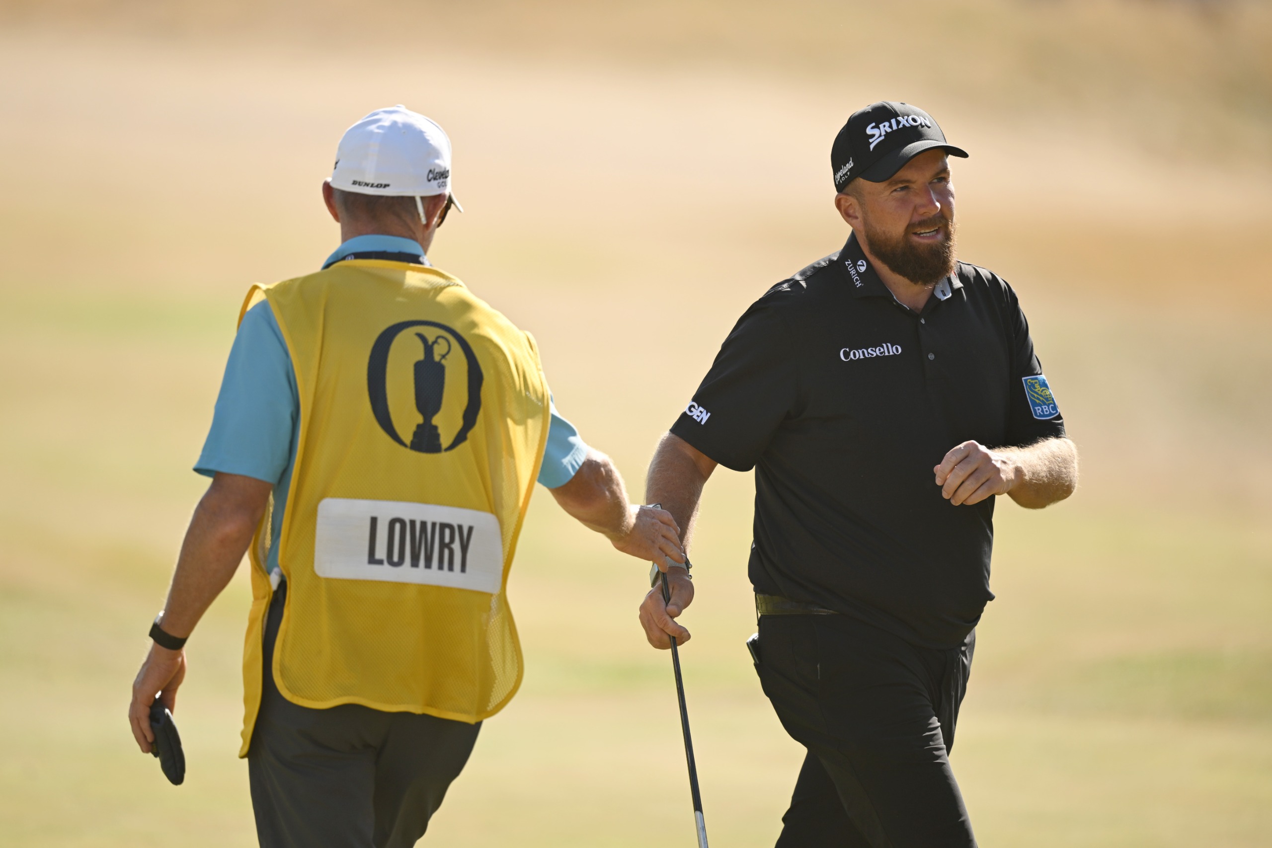Shane Lowry with his caddie at the Open Championship 2026