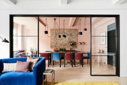 Modern pink dining room with open plan layout