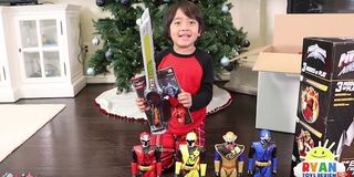 Ryan opening Power Rangers toys