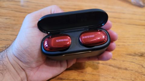 The Shure Aonic Free wireless earbuds sitting in the charging case