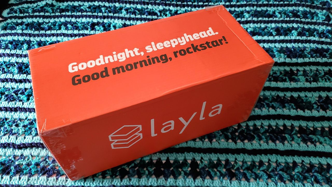 Layla Kapok Pillow in its red box