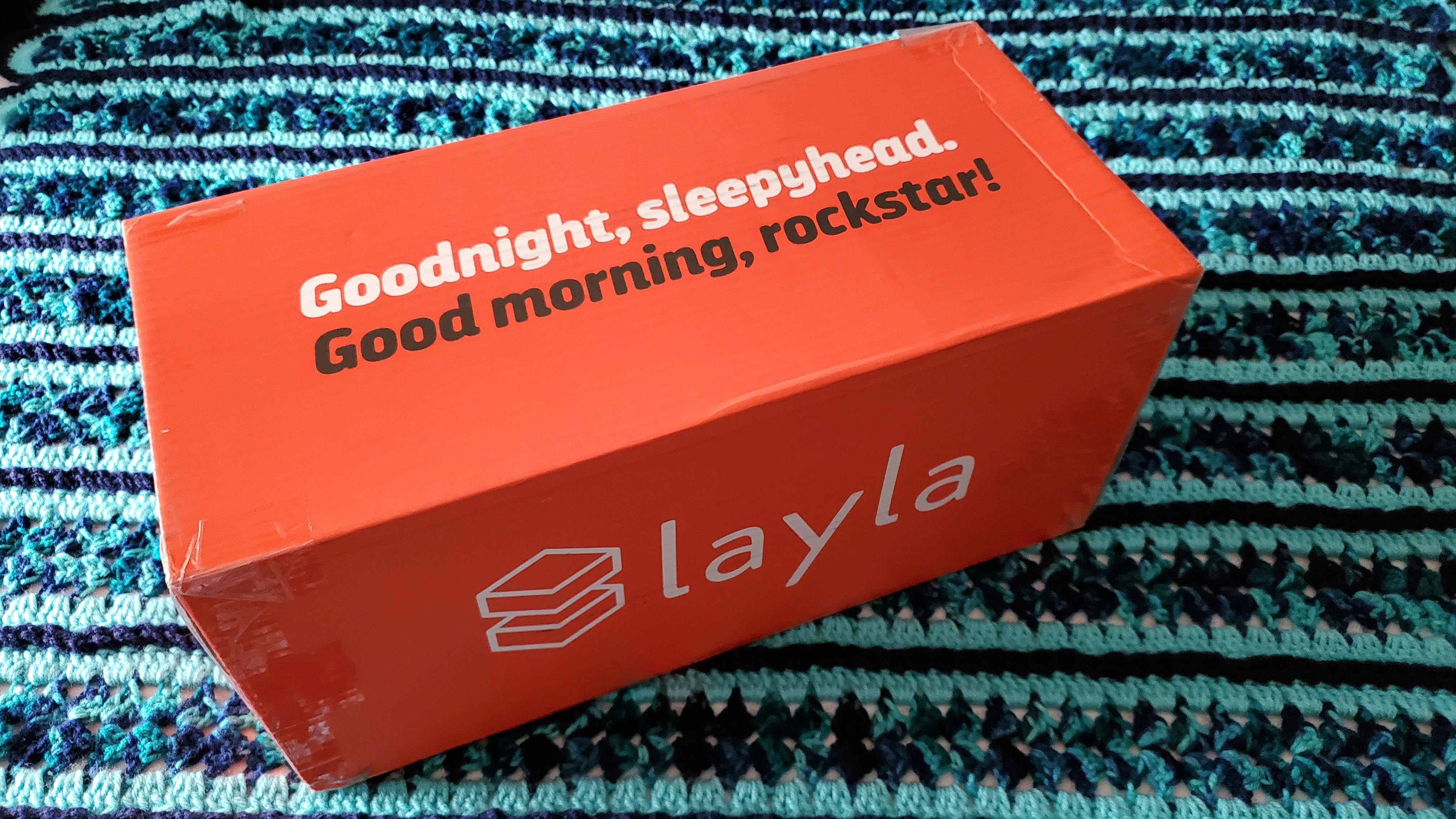 Layla Kapok Pillow in its red box