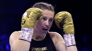 Katie Taylor looks on during the IBF, WBA, WBC and WBO Undisputed Lightweight World Title fight 