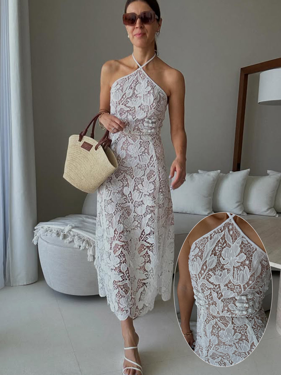 La rédactrice de mode, Judith Jones, en robe en dentelle blanche