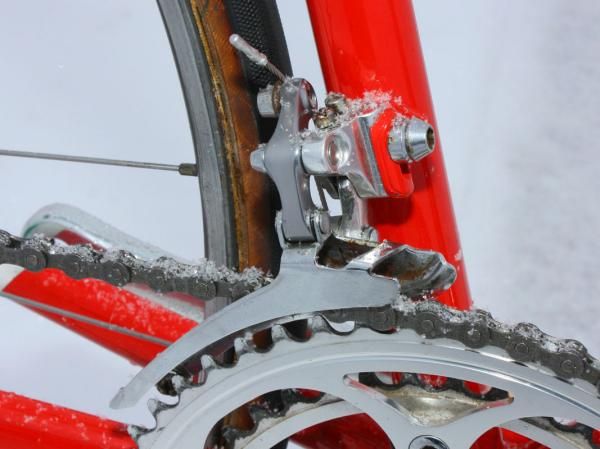Just a hint of rust marks the chromed cage of this Shimano Dura-Ace front derailleur.