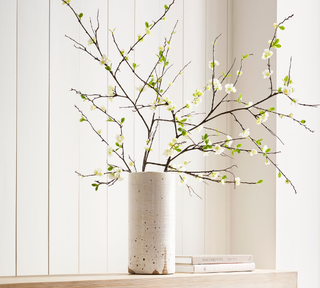 Faux white blossom branch flowers.