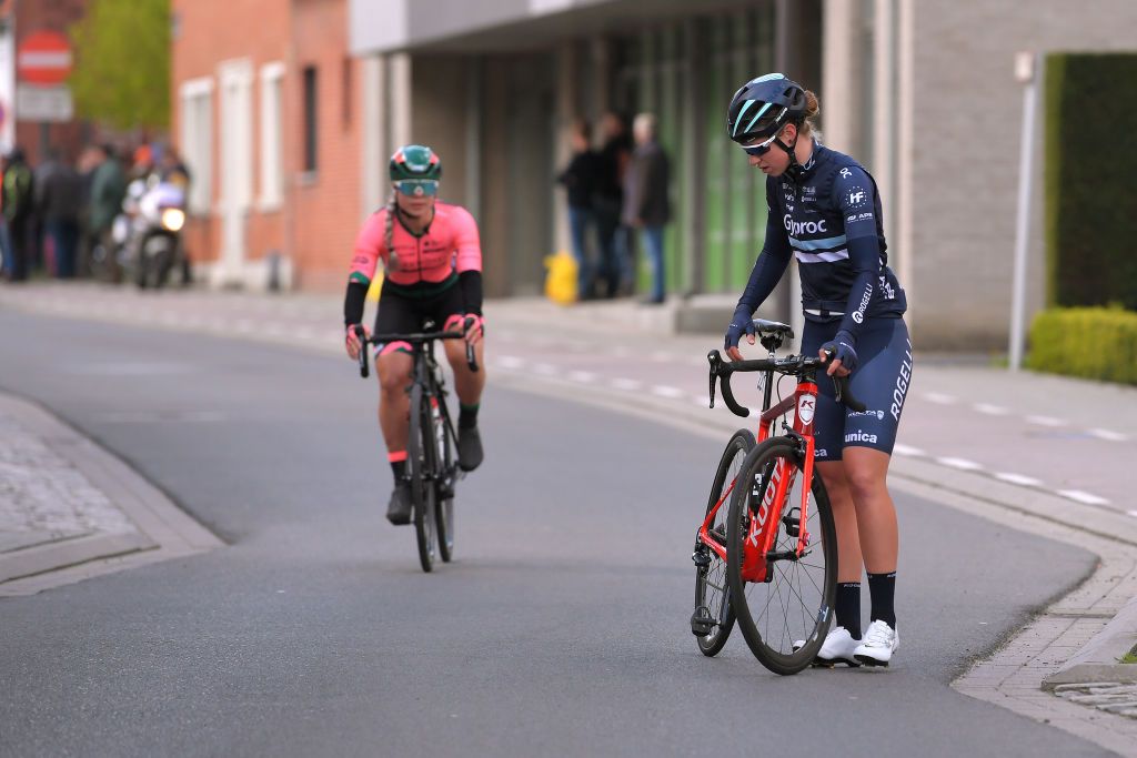 Riders pick up from a crash