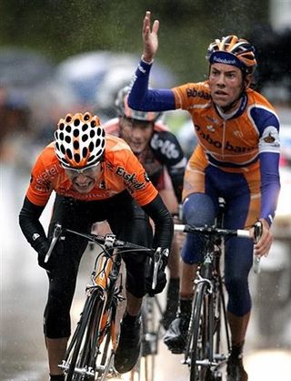 Dutch rider Thomas Dekker (Rabobank) (right), second for today, reacts as Spanish winner Igor Anton (Euskaltel - Euskadi) crosses the finish line.