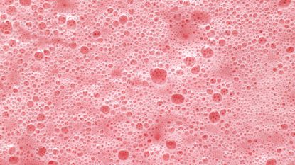 Healthy smoothie recipes: A close up shot of a raspberry smoothie