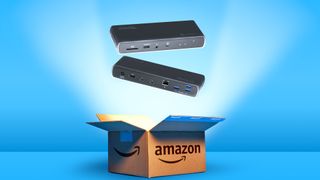 A blue backdrop with an Amazon box opening with a burst of light to reveal a docking station.