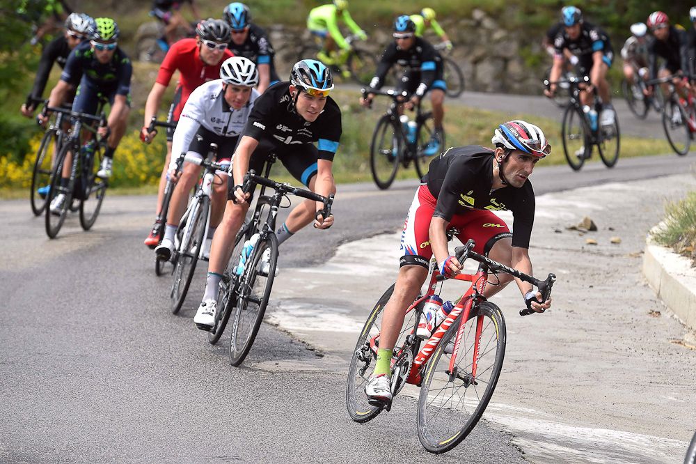 Riders take it easy on a descent.