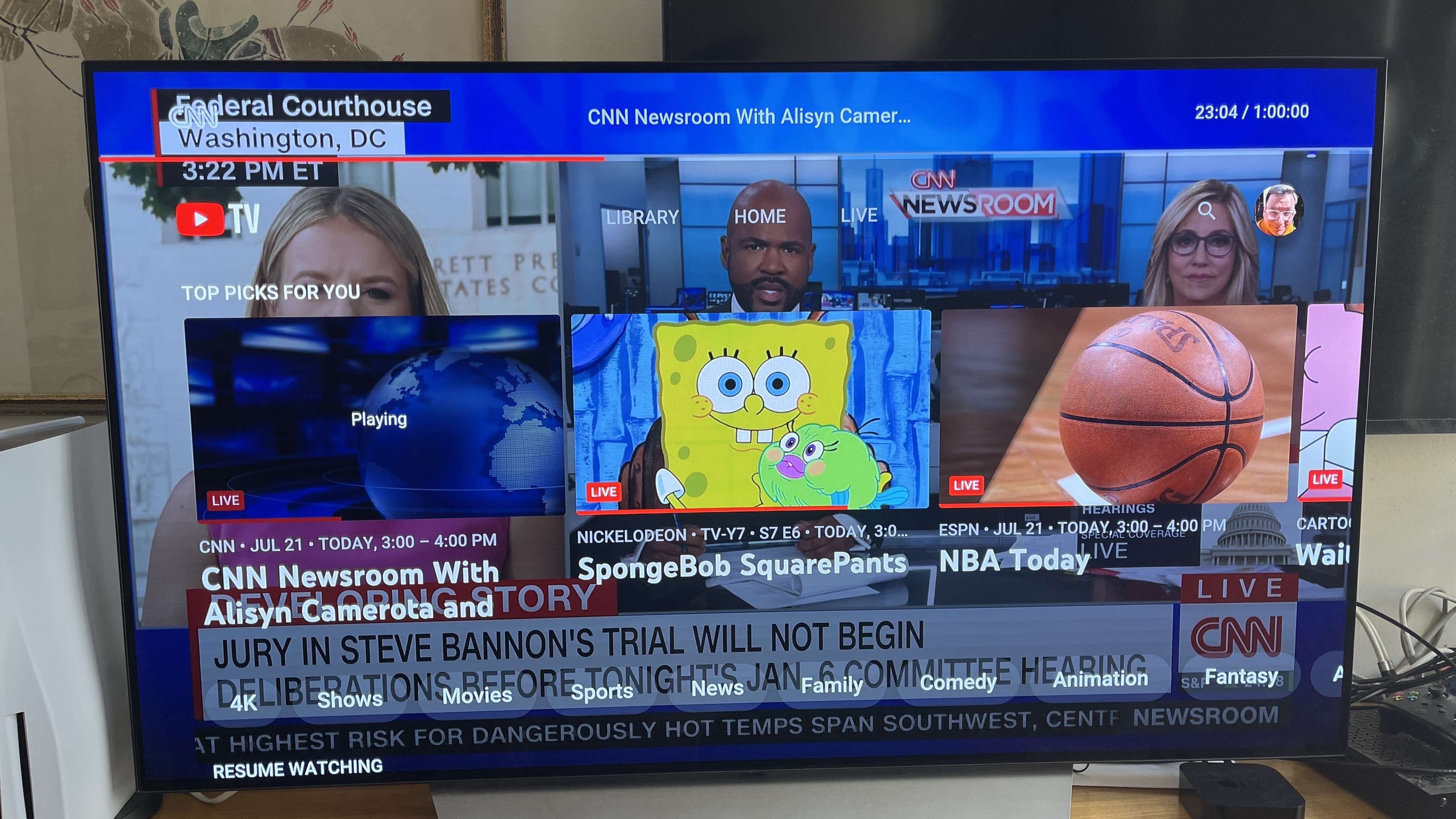 YouTube TV's home screen with graphics in front of CNN