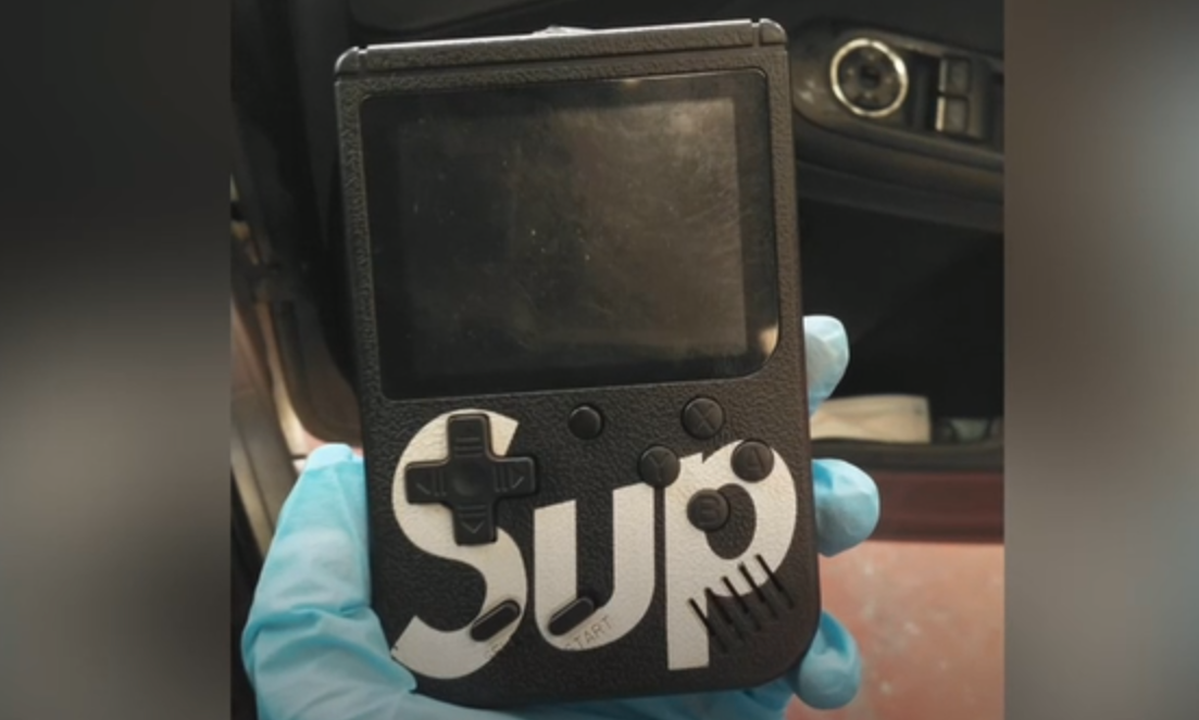 A device for stealing cars disguised as a Game Boy.