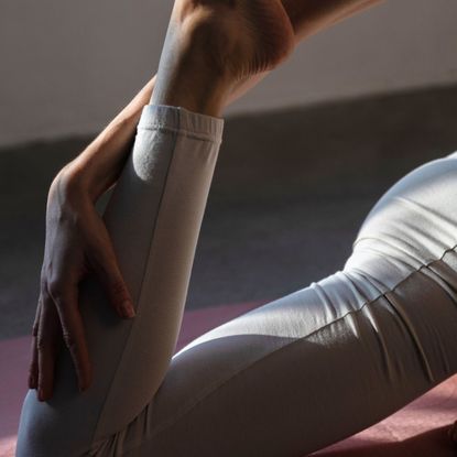 Health freelancer Rebecca Lawton trying Pilates heel taps