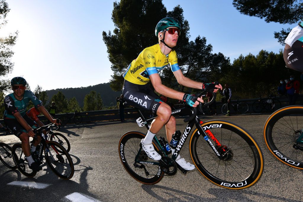 VALENCIA SPAIN FEBRUARY 06 Aleksander Vlasov of Russia and Team Bora Hansgrohe Yellow Leader Jersey competes during the 73rd Volta A La Comunitat Valenciana 2022 Stage 5 a 92km stage from Paterna to Valencia VCV2022 on February 06 2022 in Valencia Spain Photo by Dario BelingheriGetty Images