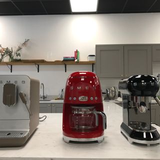 smeg drip coffee maker next to each other