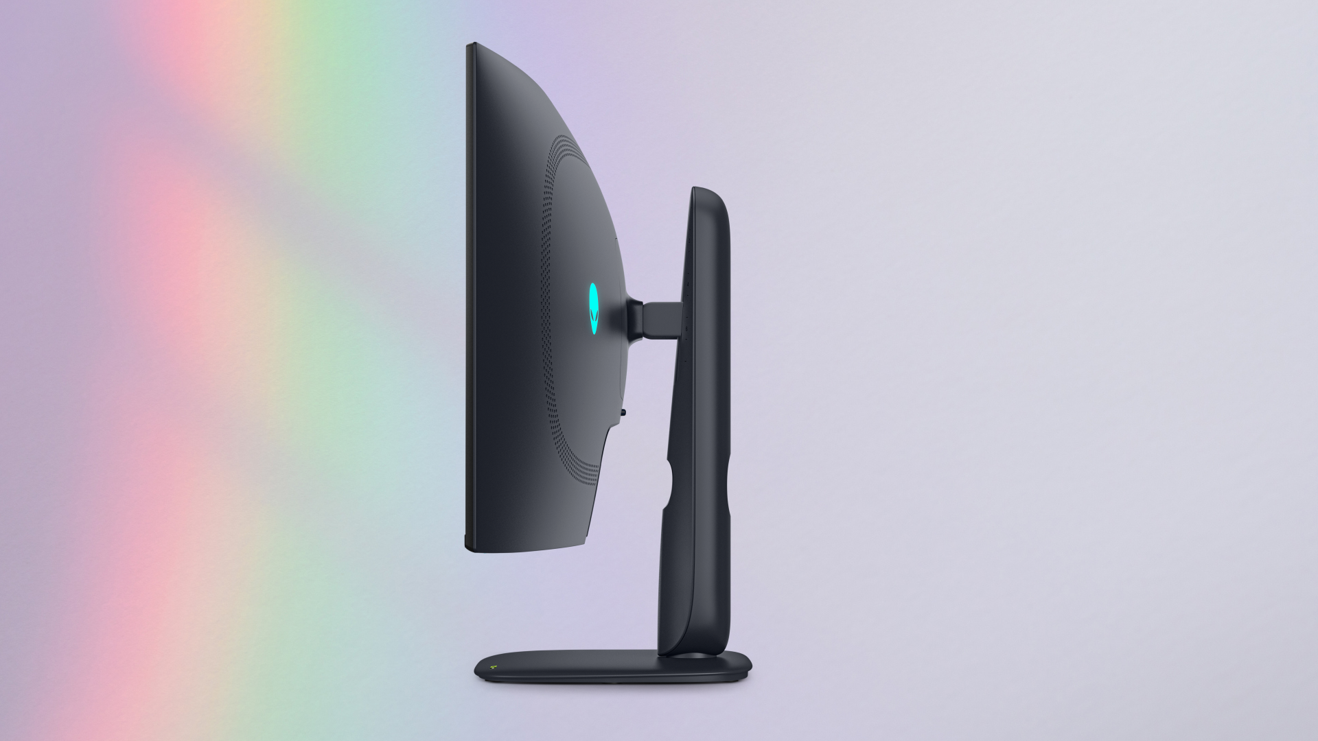 Side profile of the Alienware 39 5K OLED monitor showcasing its 1500R curvature, Nova Black finish, and height-adjustable stand.