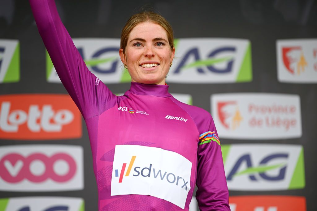 LIEGE BELGIUM APRIL 23 Demi Vollering of The Netherlands and Team SD Worx celebrates at podium as Pink UCI Womens WorldTour Leader Jersey winner during the 7th Liege Bastogne Liege 2023 Womens Elite a 1428km one day race from Bastogne to Lige UCIWWT on April 23 2023 in Lige Belgium Photo by Luc ClaessenGetty Images