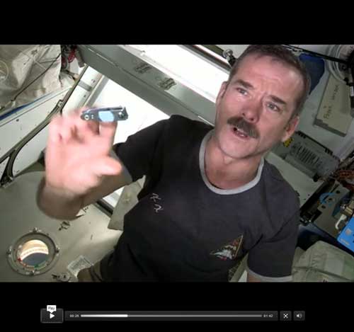 Chris Hadfield cutting fingernails