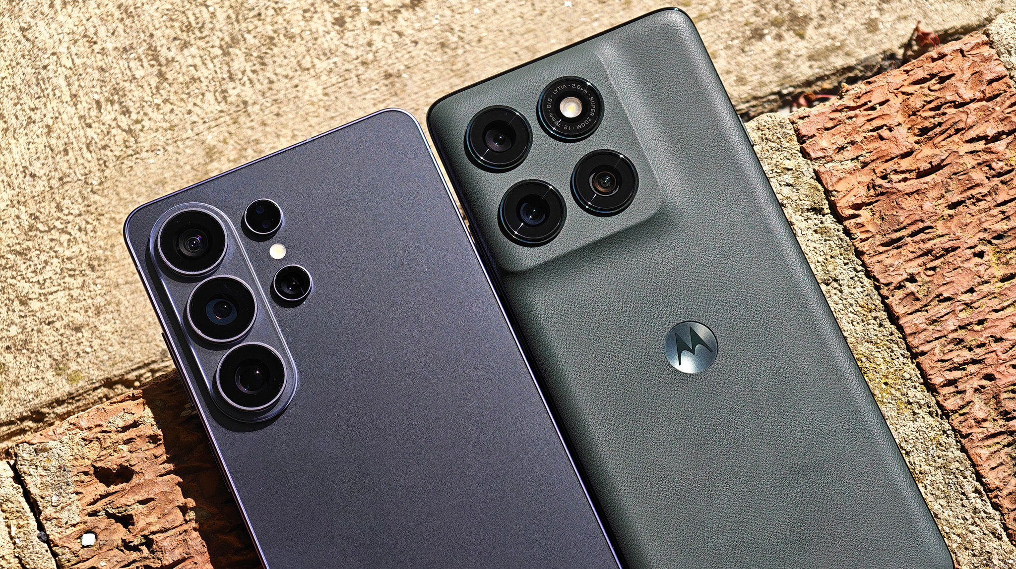 A blue Samsung Galaxy S26 Ultra next to a green Motorola Edge 2025