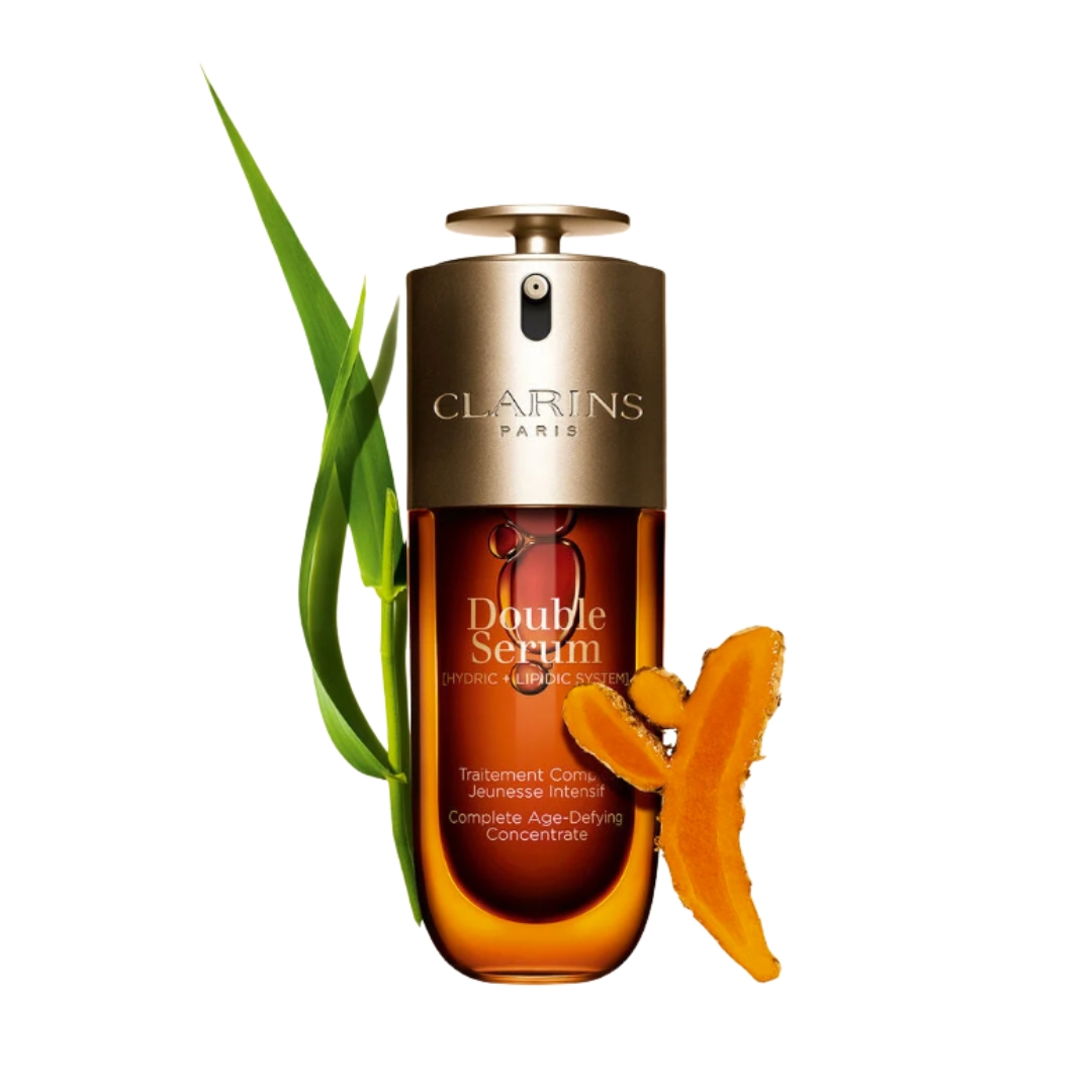 A product shot of the Clarins Double Serum, alongside two ingredients featured in the formula/ on a white background