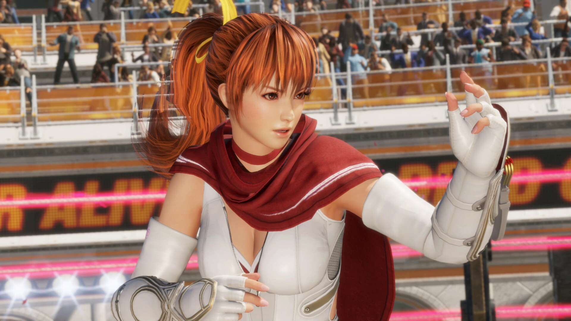 Dead or Alive 6 Last Round screenshot showing fighter Kasumi who has red hair tied up in a ponytail with her hands raised, poised to fight