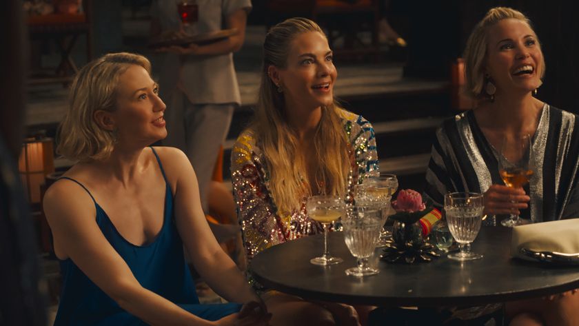 Kate, Jaclyn and Laurie sitting drinking cocktails 