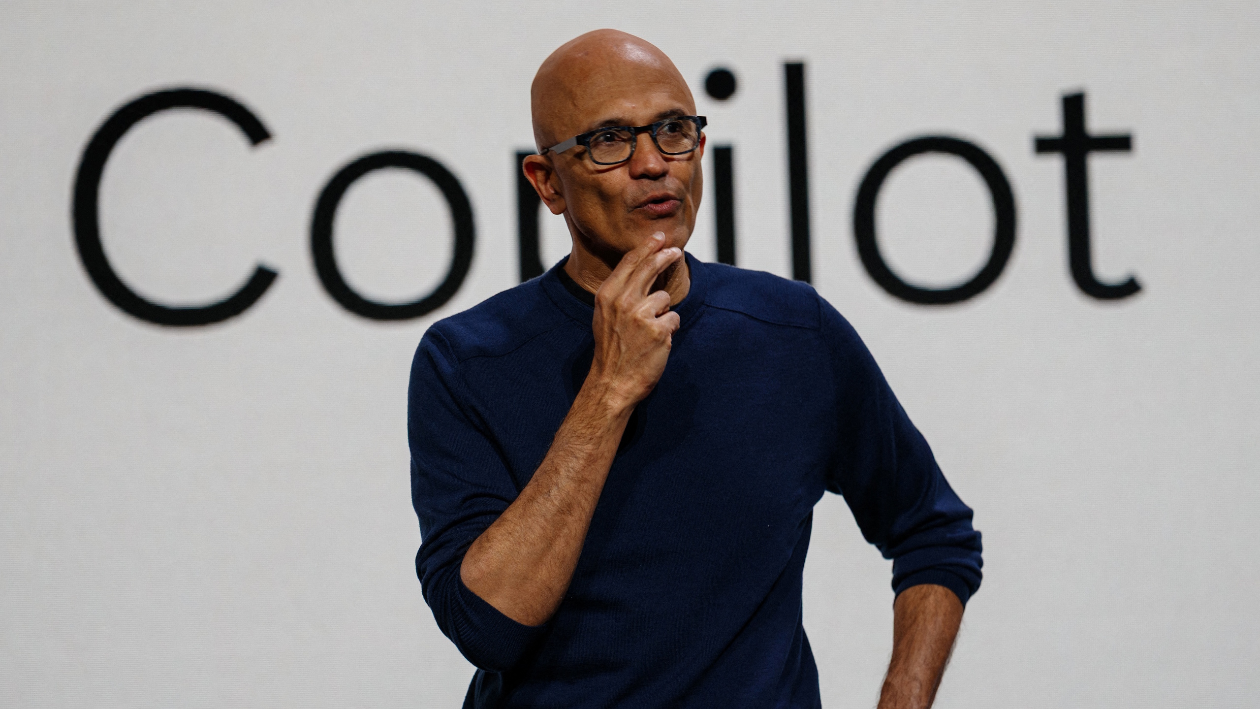 Microsoft CEO Satya Nadella speaks at a Microsoft Frontier Tour event in the CNIT building at La Defense business district in Puteaux, near Paris, on October 20, 2026. (Photo by Dimitar DILKOFF / AFP via Getty Images)