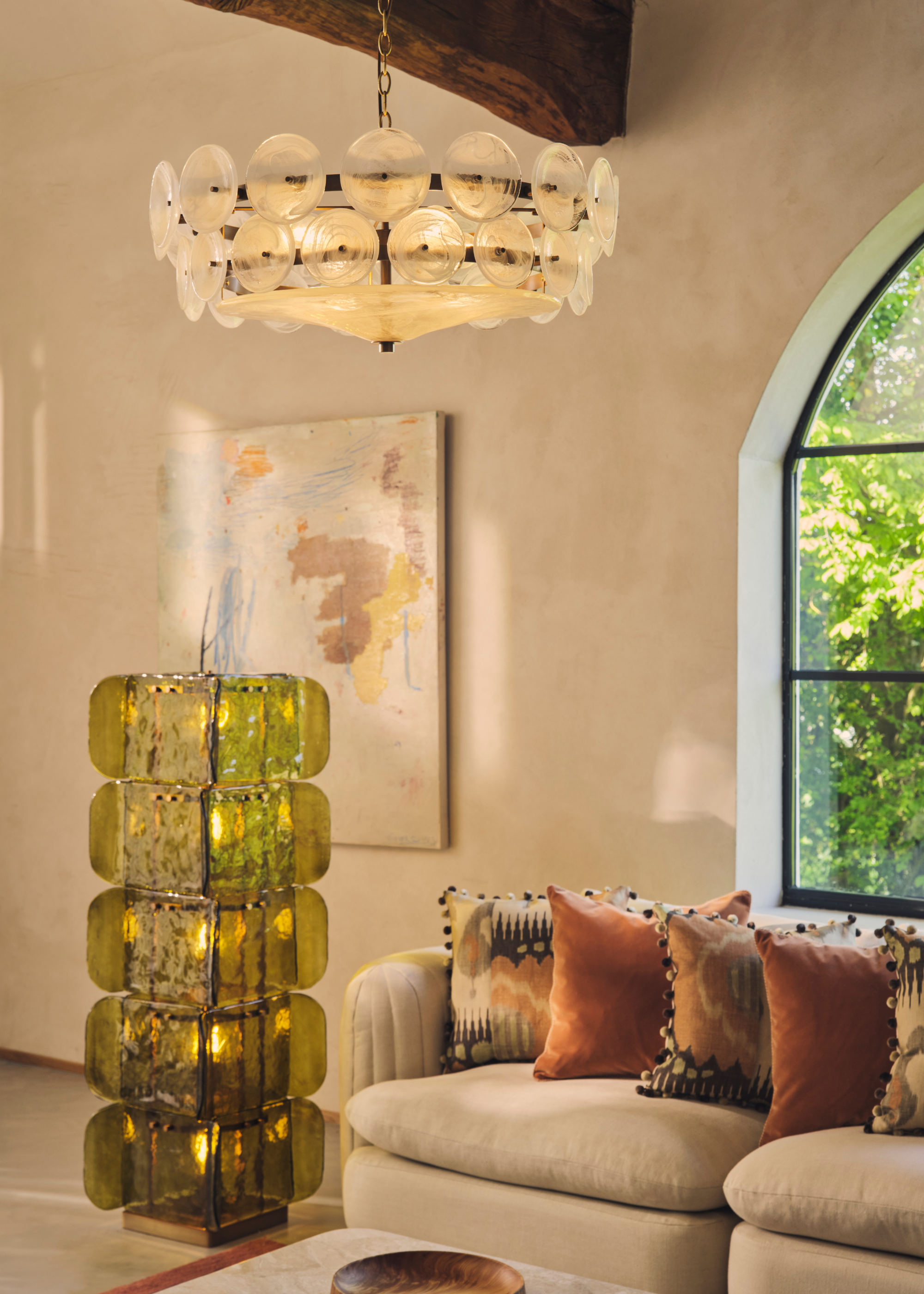 two glass light fittings, one green floor lamp and one glass rounds chandelier