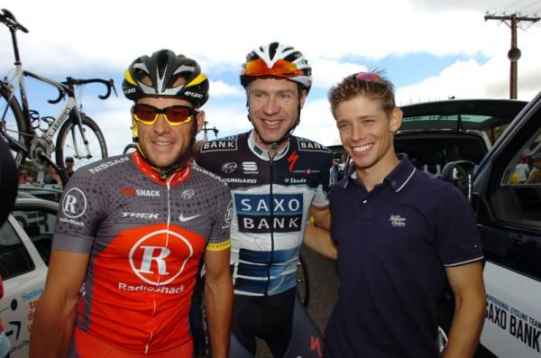 Lance Armstrong (RadioShack) and Jens Voight (Saxo Bank) meet former Moto GP World Champion Casey Stoner before the start