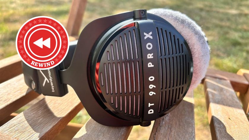 Beyerdynamic DT 990 ProX on table with Rewind logo