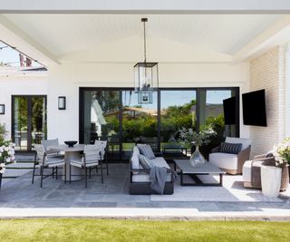 LA home outside patio space with white exterior walls