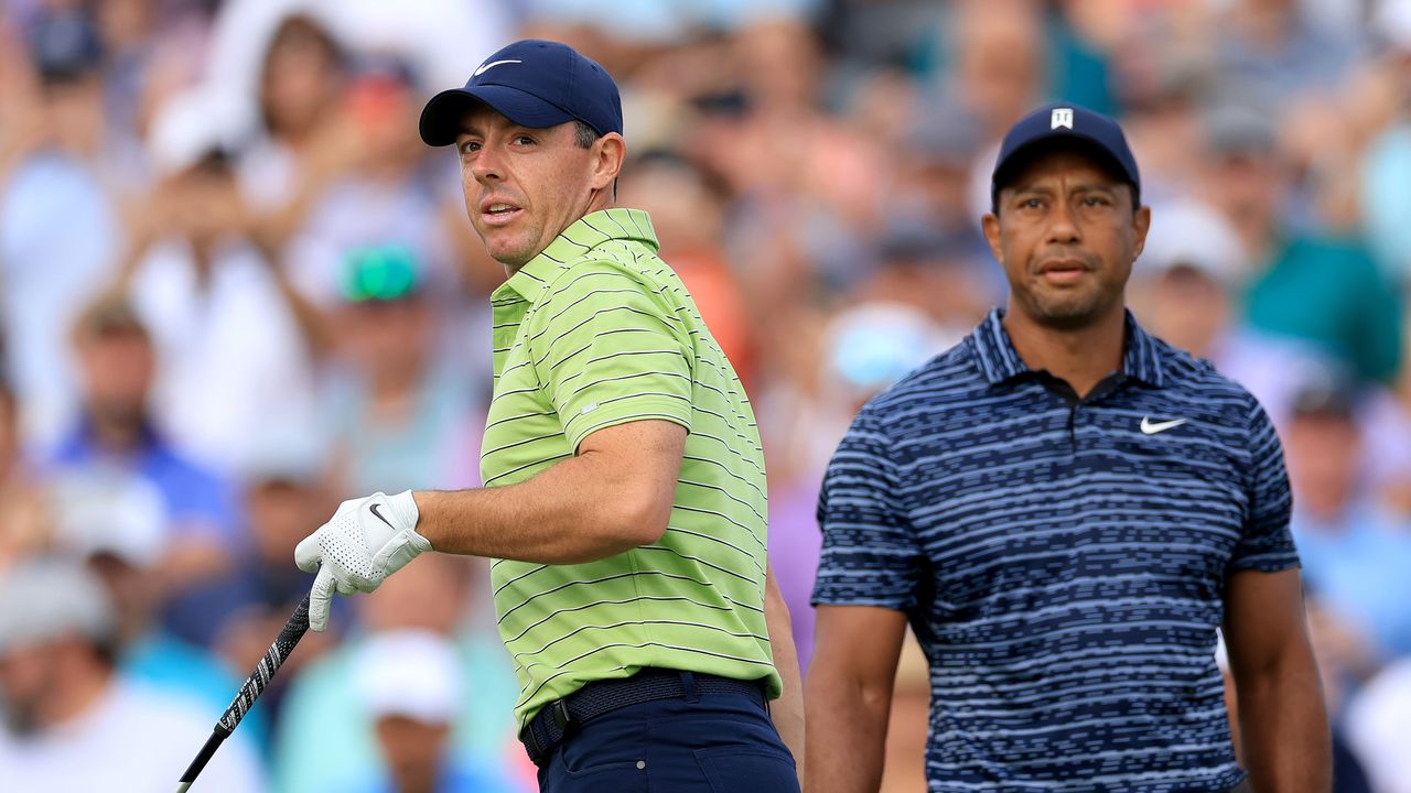 Rory McIlroy and Tiger Woods after teeing off