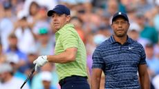 Rory McIlroy and Tiger Woods after teeing off