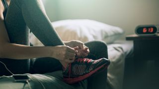 woman heading out for an early morning run